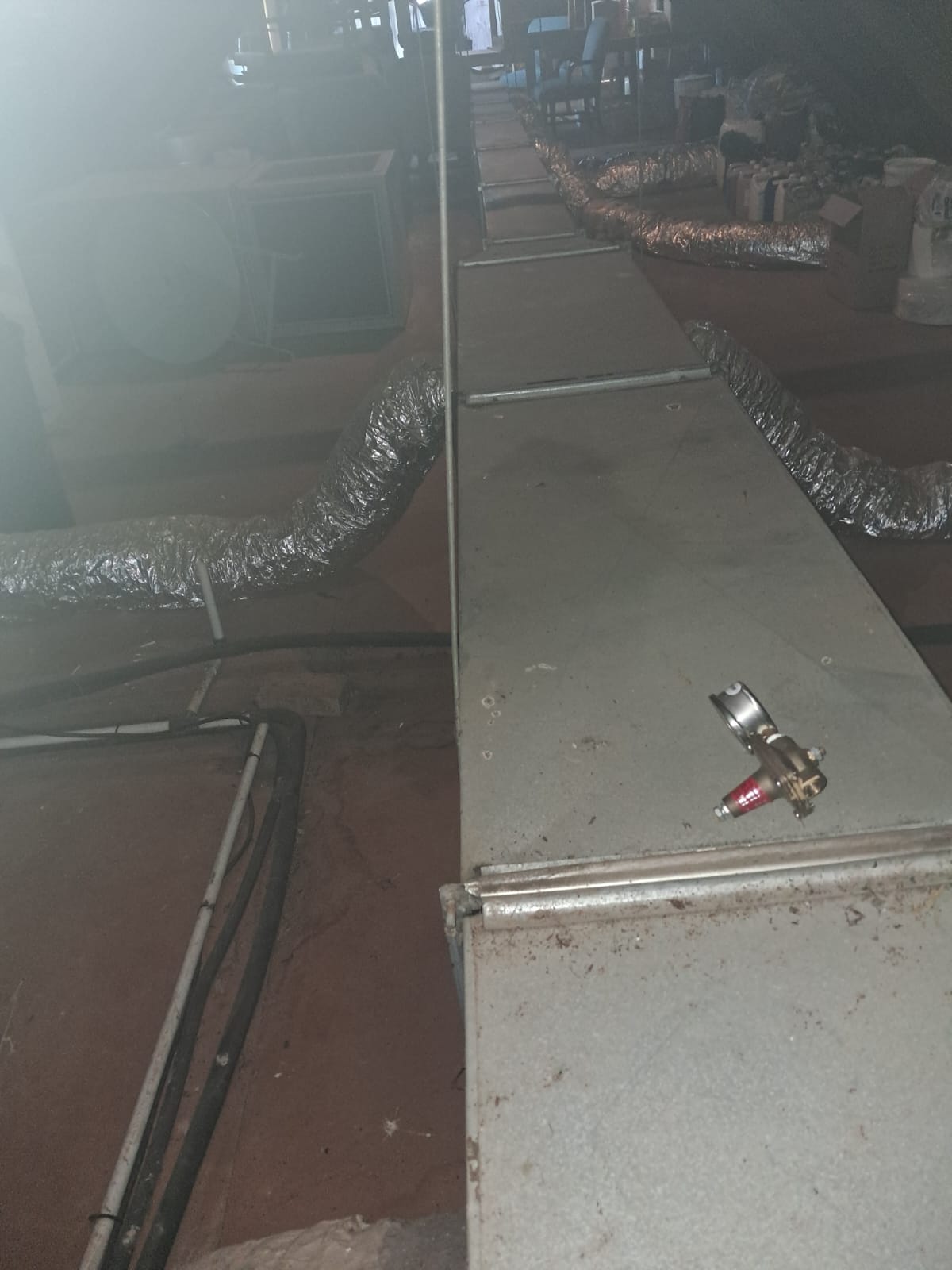 Commercial air-conditioning ductwork and access panels during system inspection