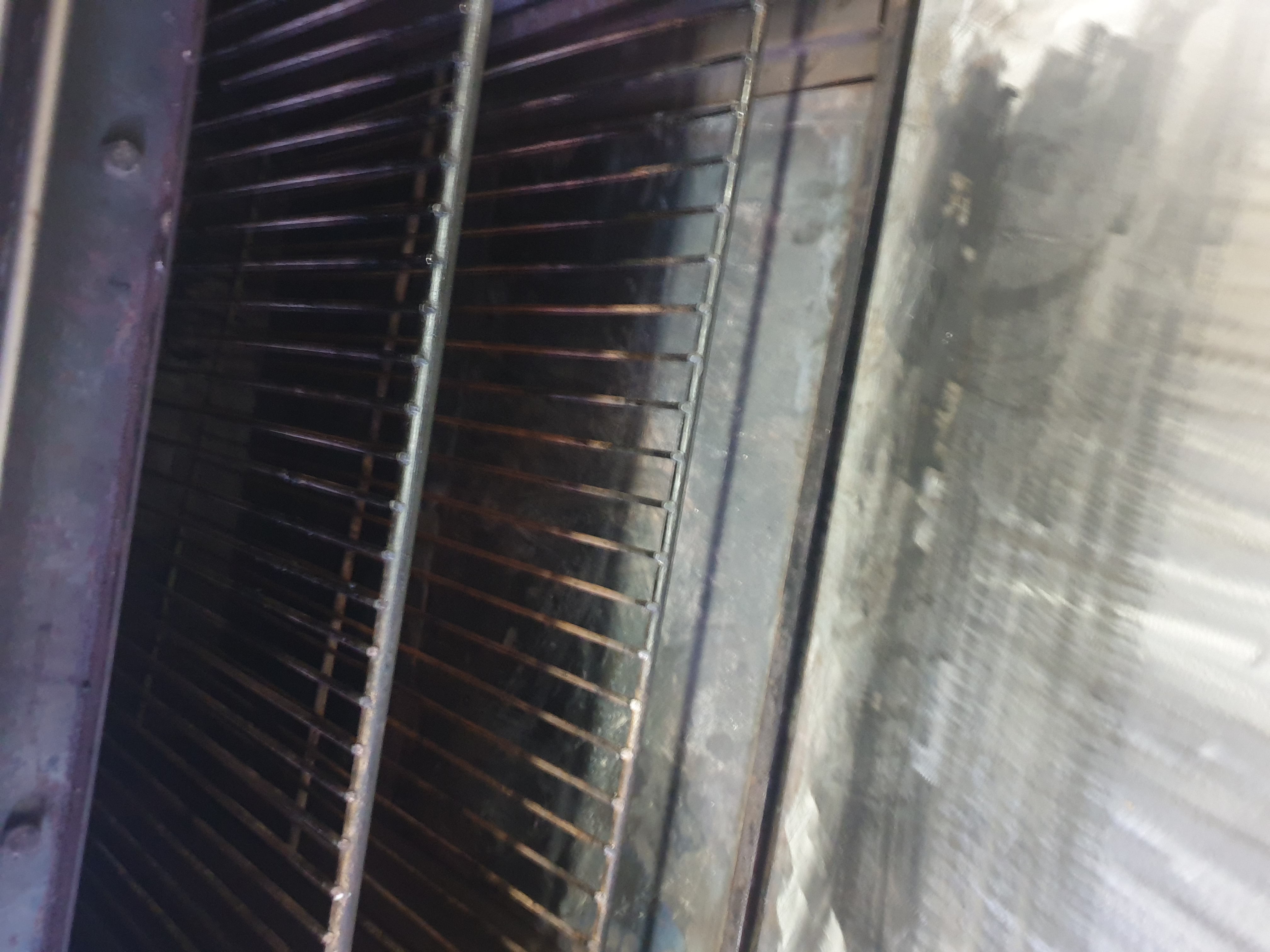 Commercial oven interior and rack area after repair checks