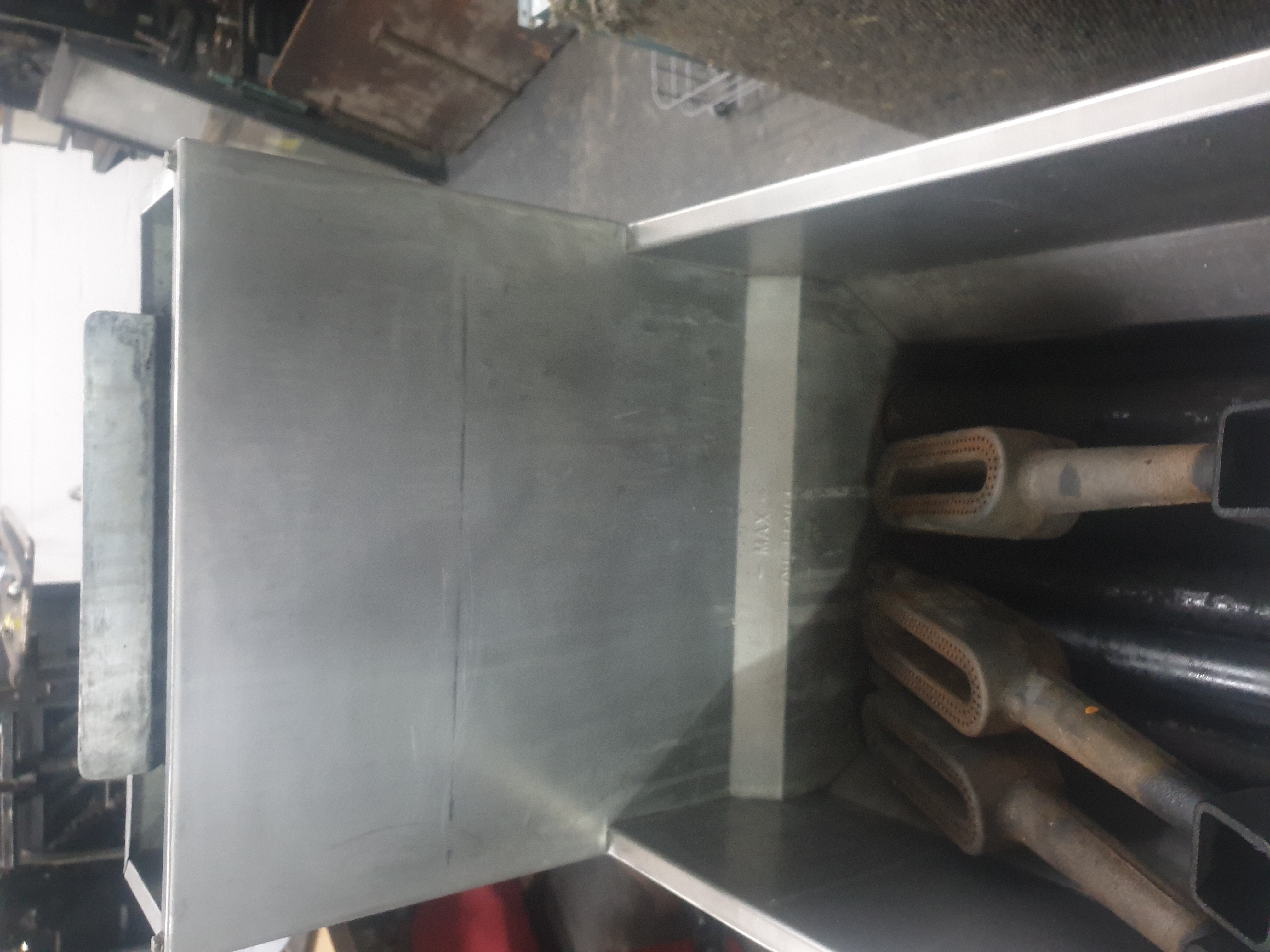 Commercial fryer burner venturi and combustion chamber inspection