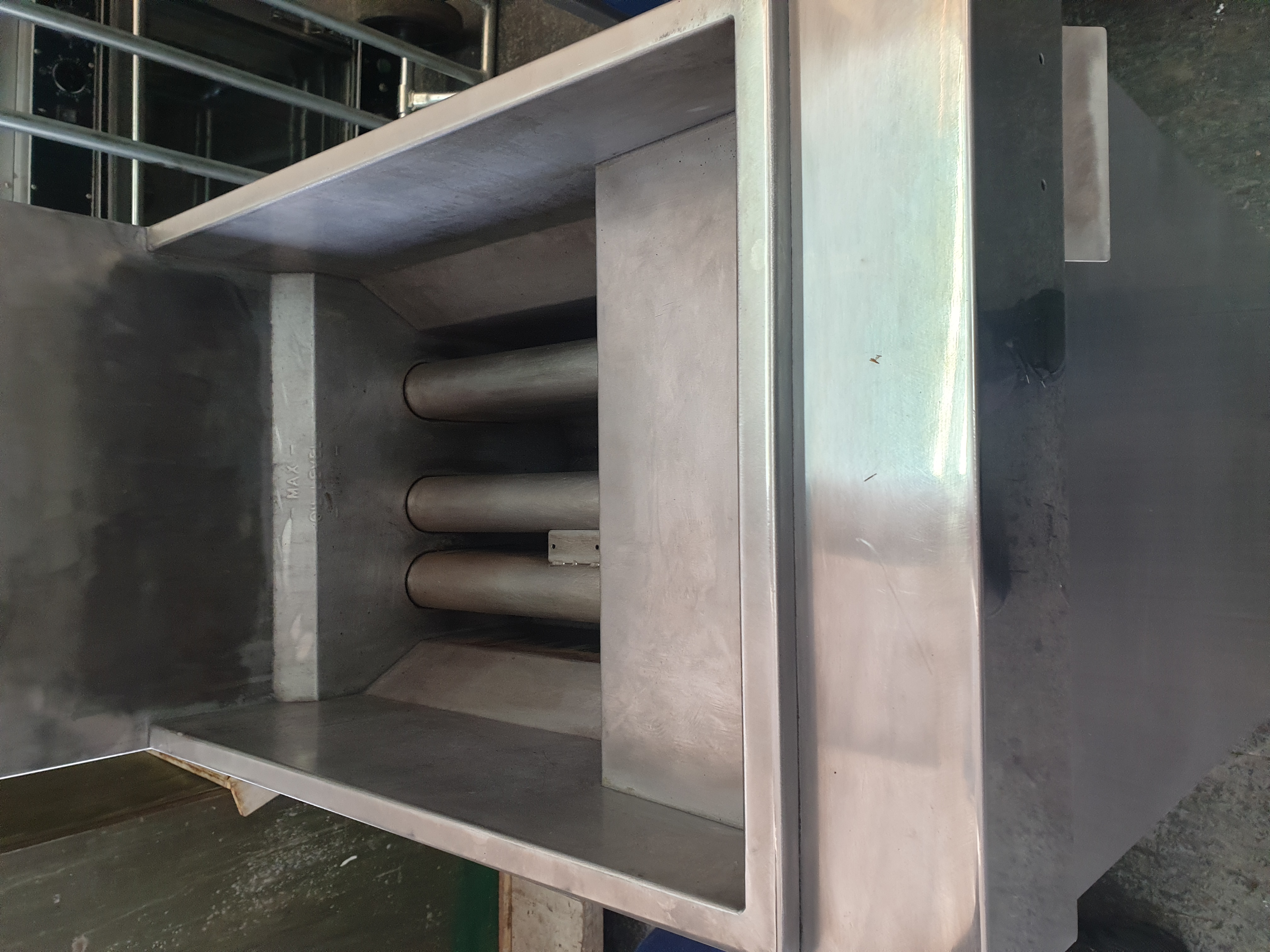 Cleaned commercial gas fryer heat tubes before final assembly
