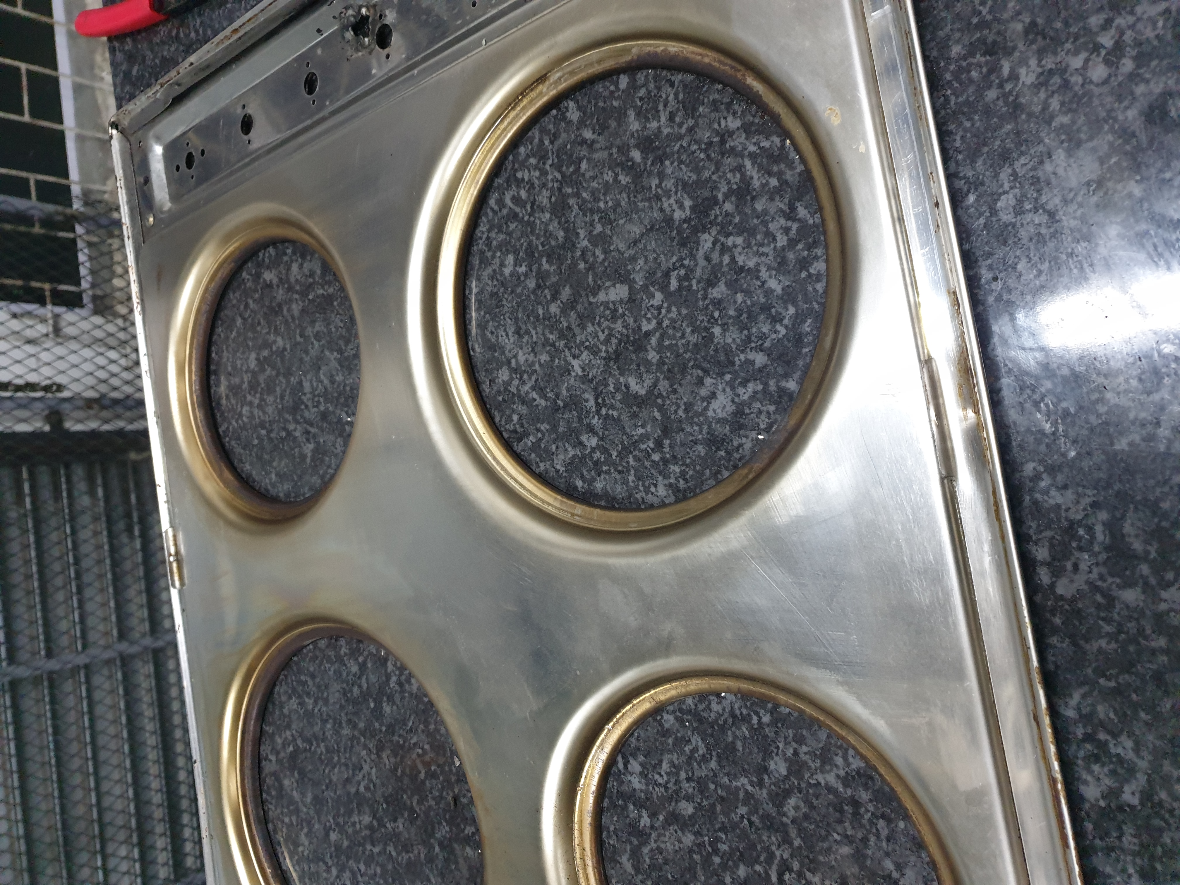 Commercial hotplate terminal and control wiring during repair