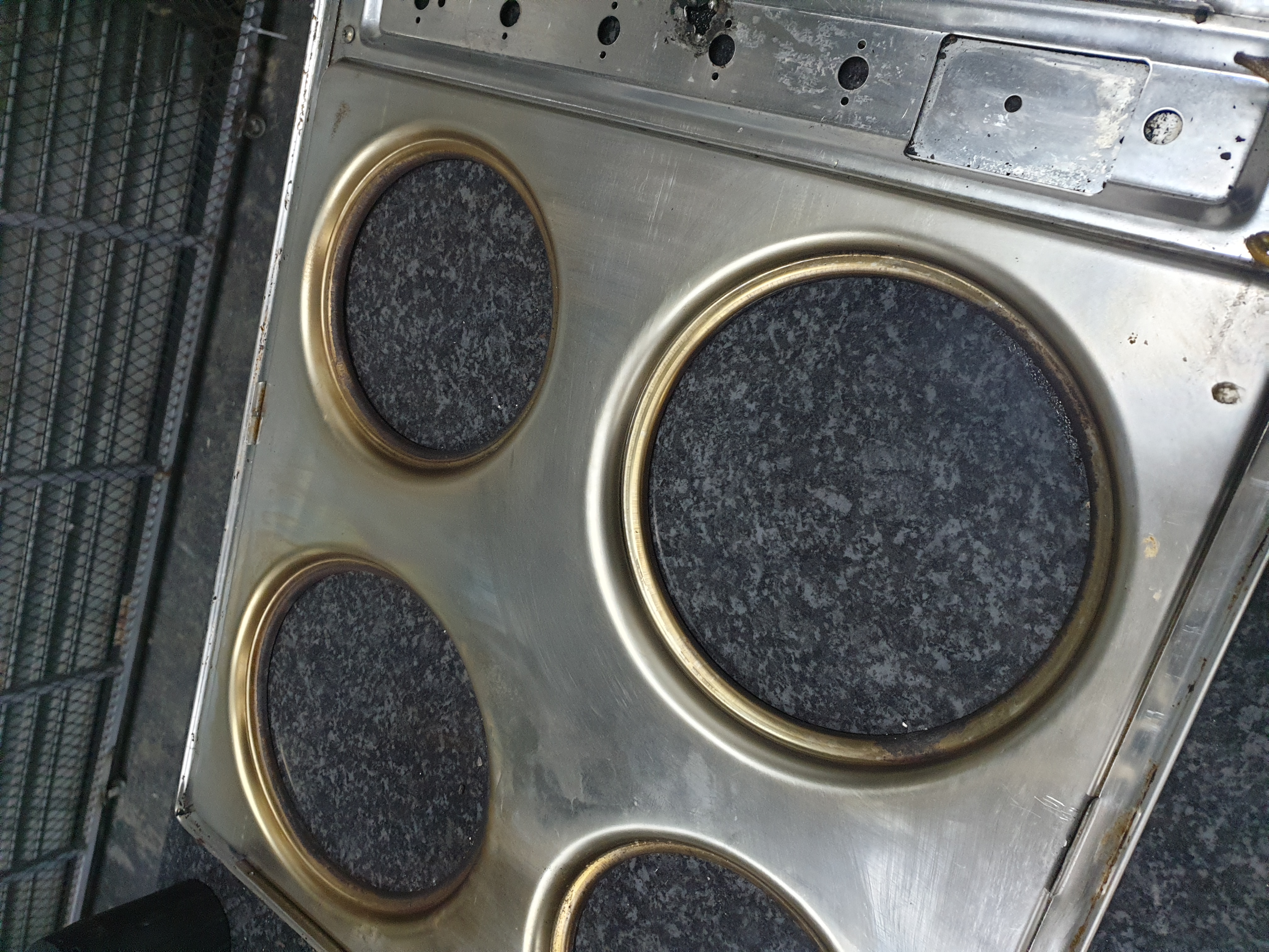 Commercial hotplate top before repair and rewiring