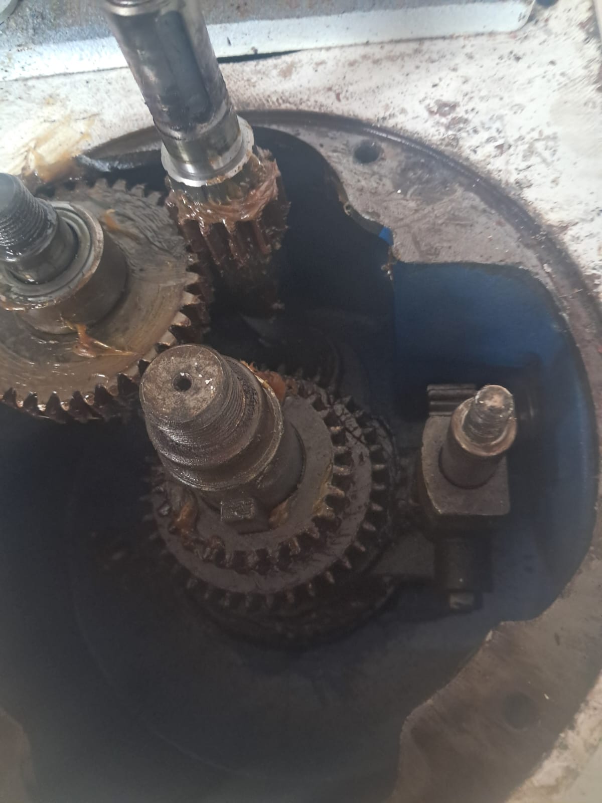 Macadams mixer repair detail showing drivetrain and bearing service area