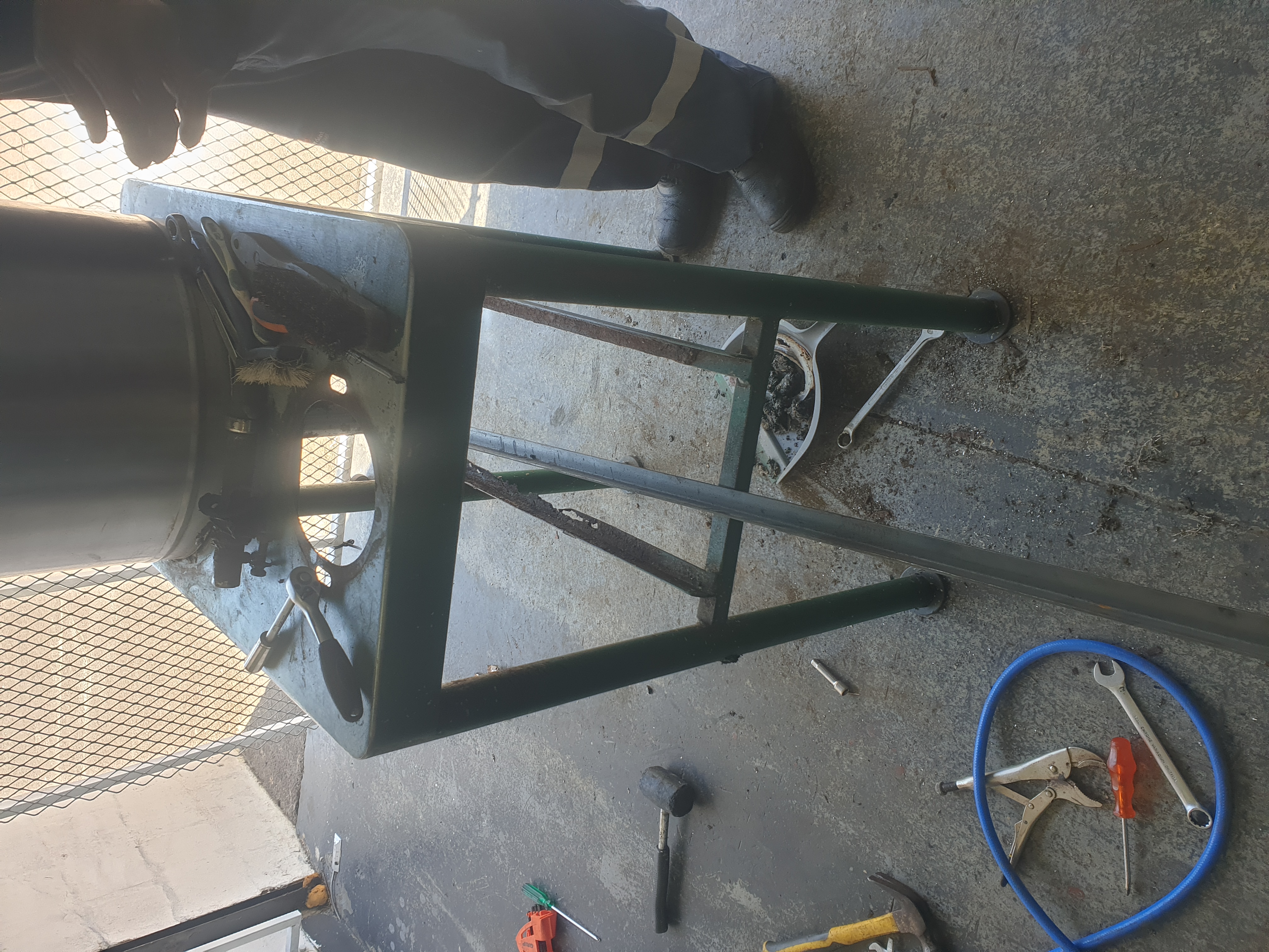 Potato peeler frame and drive area being worked on during rebuild