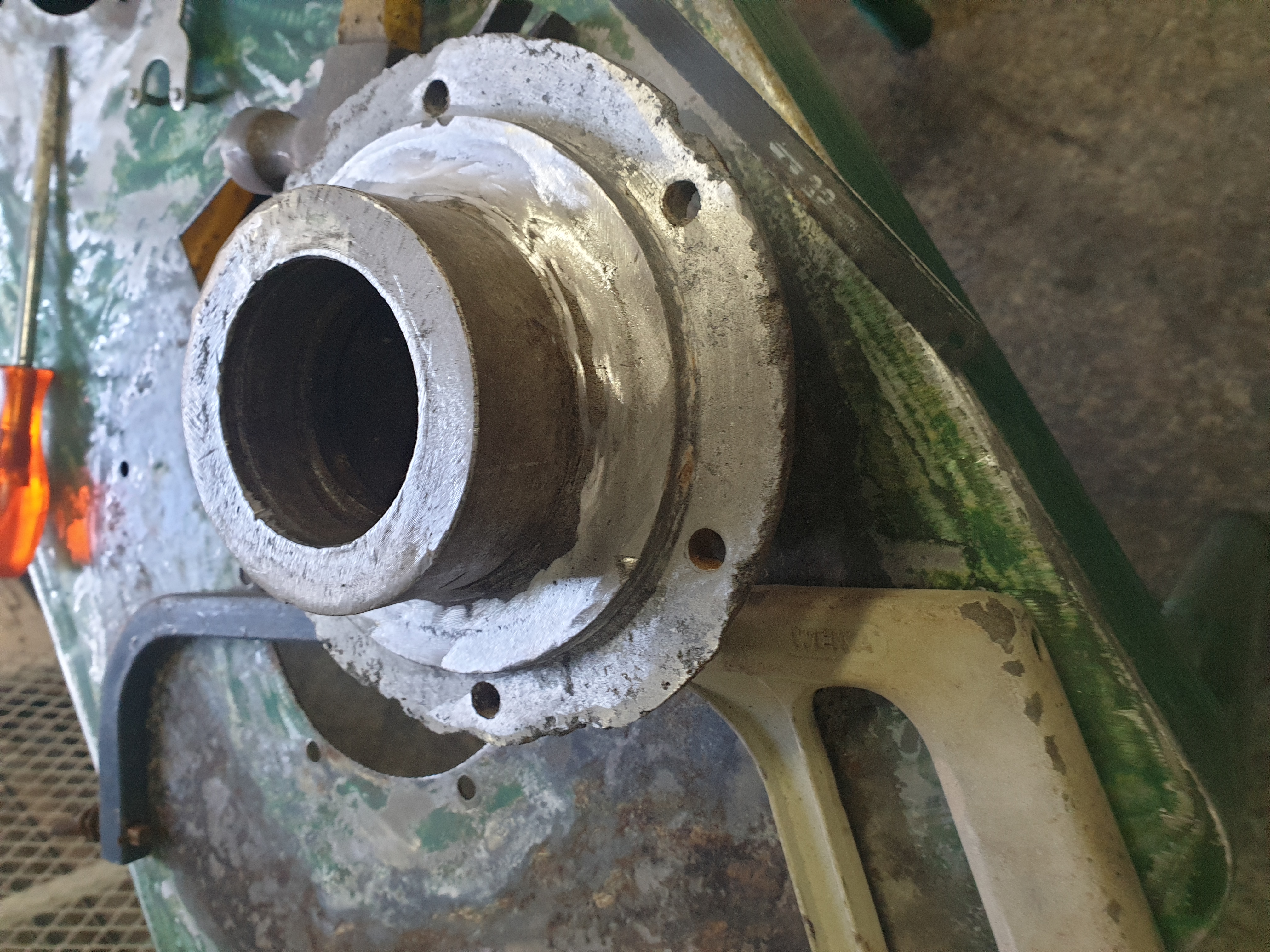 Potato peeler body prepared for repair and respray during rebuild