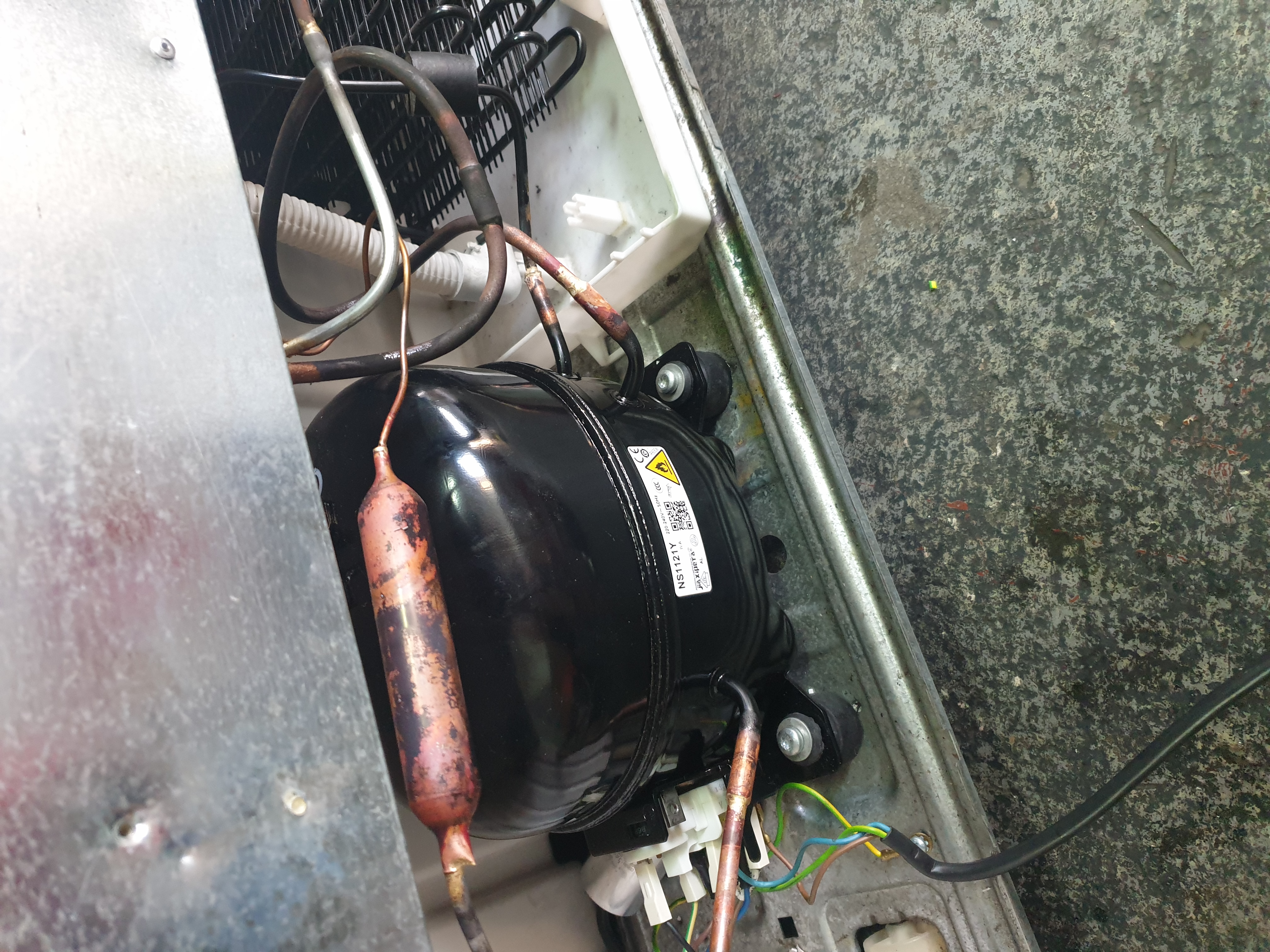 New R600a compressor fitted in a domestic side-by-side fridge