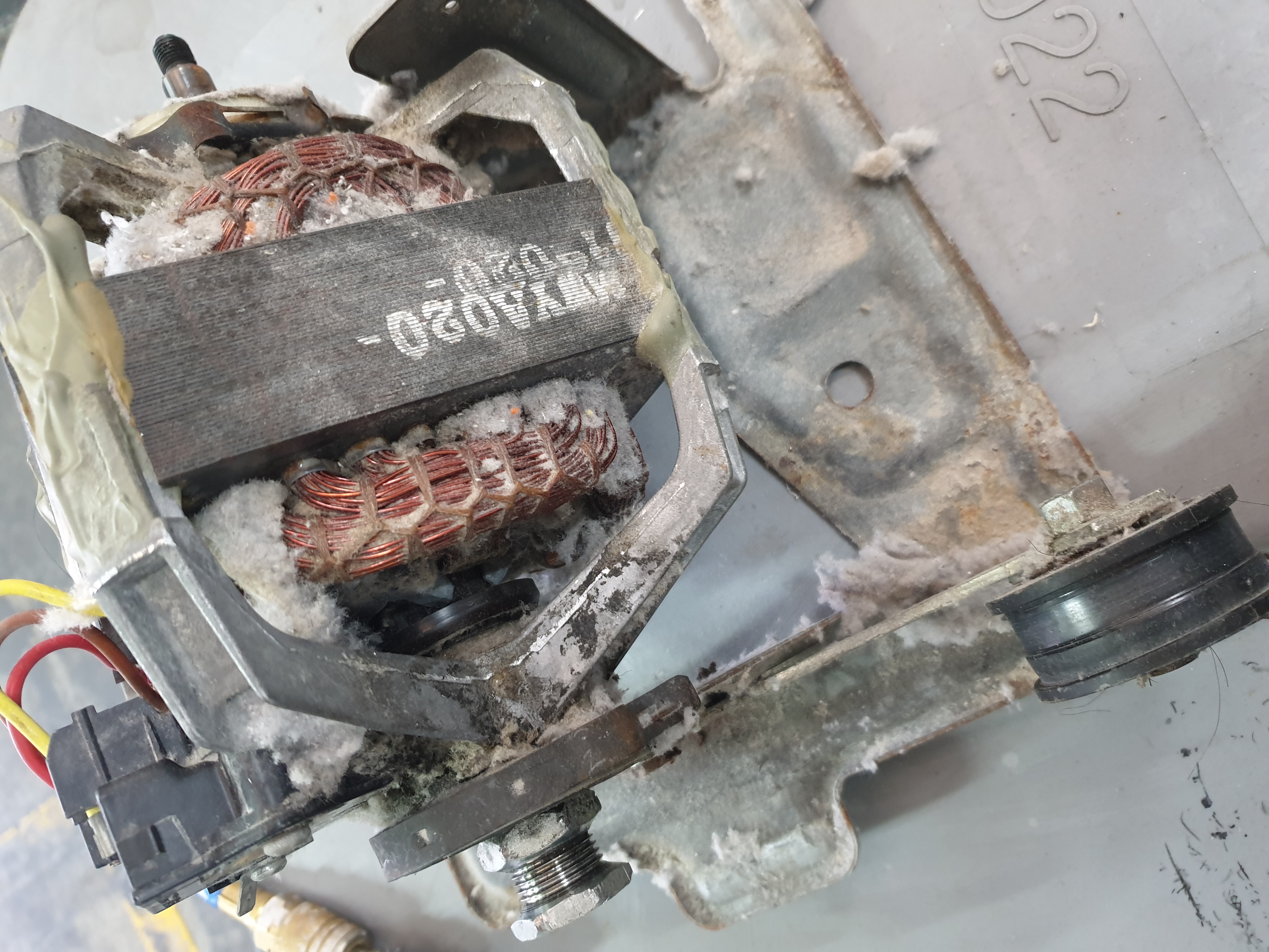 Speed Queen dryer motor packed with lint before preventative service