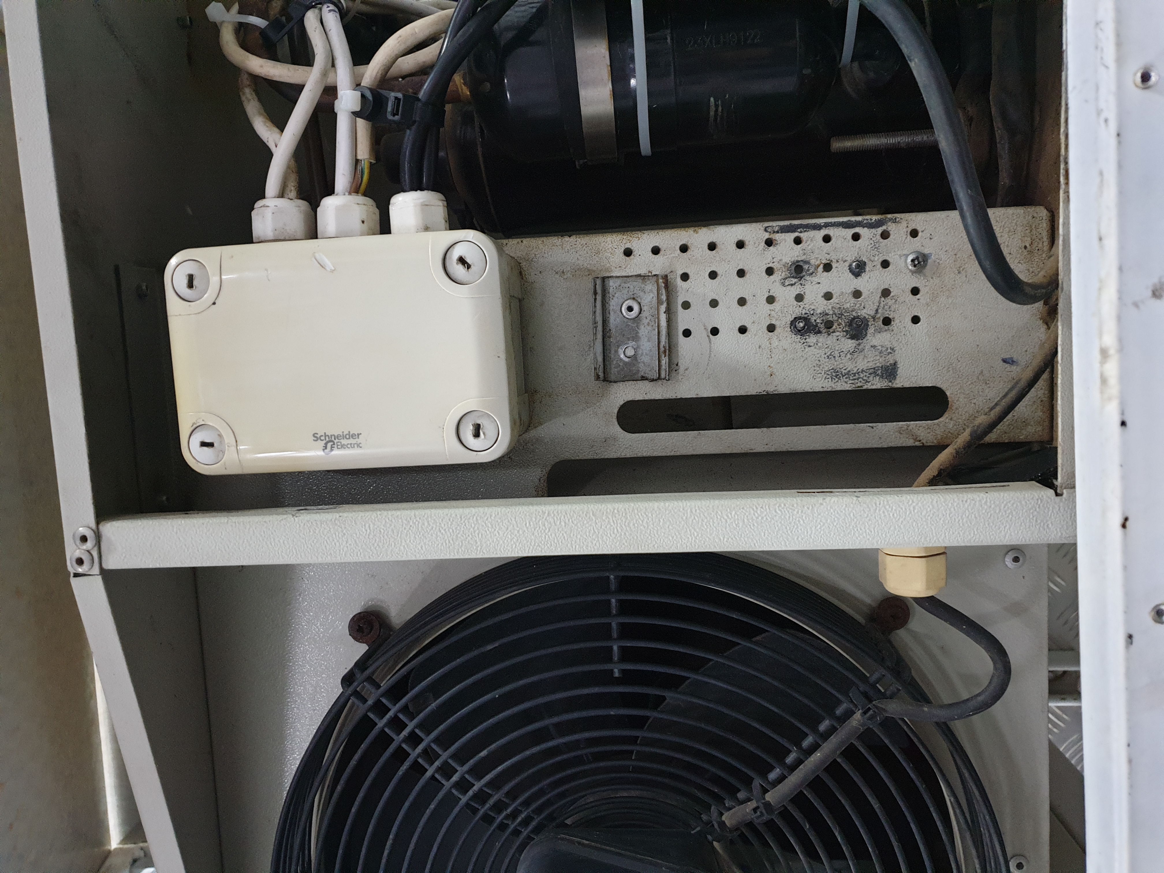Condenser fan and electrical enclosure on a mobile refrigerated trailer