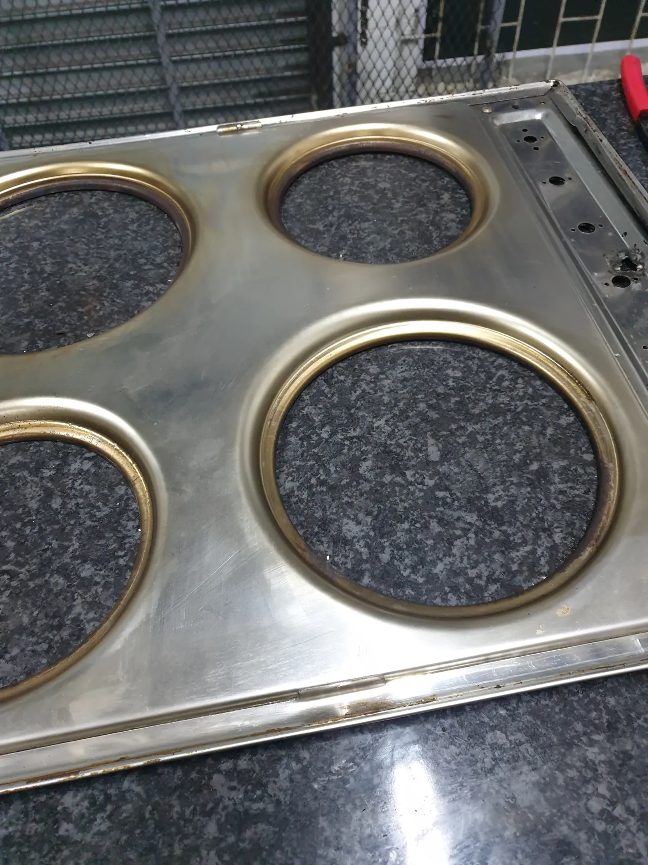 Commercial hotplate terminal and control wiring during repair