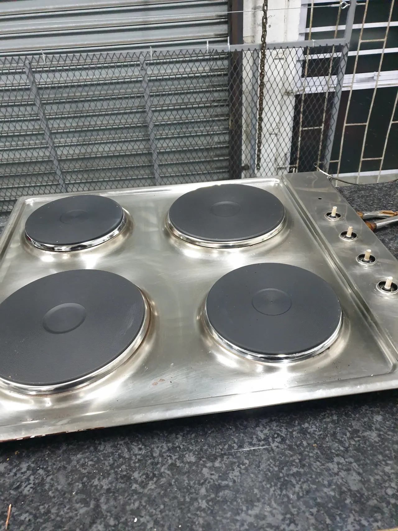 Commercial hotplate rewire nearing completion before continuity and load testing