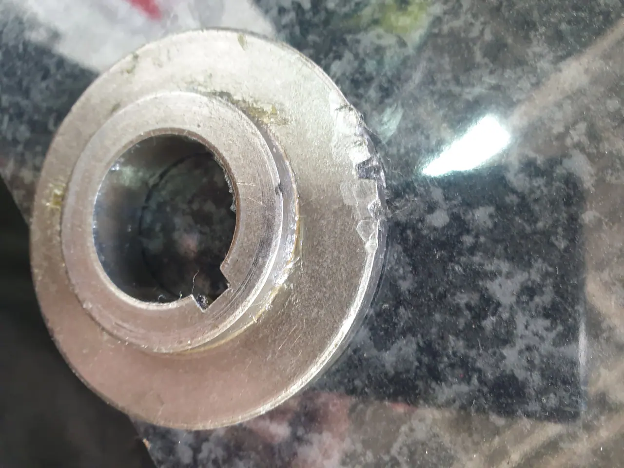 Close-up of mixer shaft and gear wear during rebuild inspection