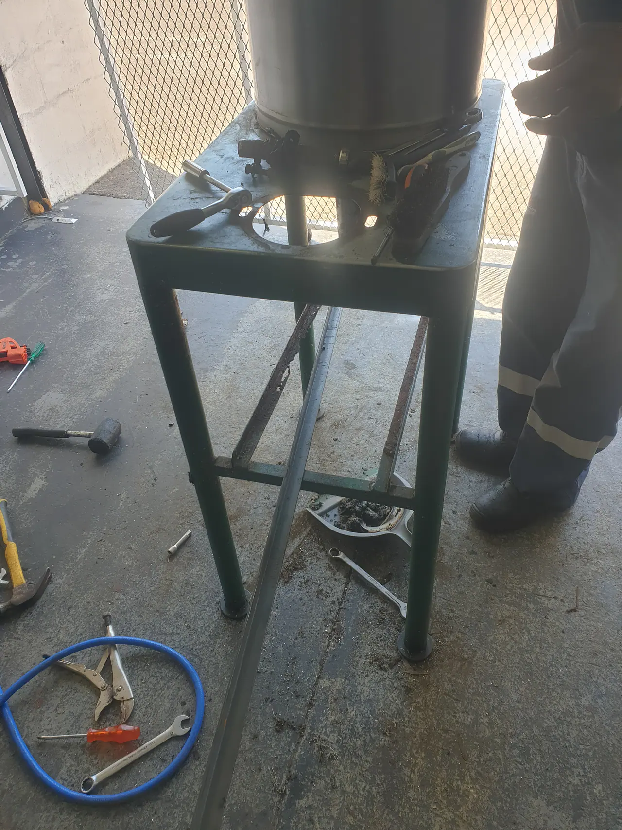 Potato peeler frame and drive area being worked on during rebuild