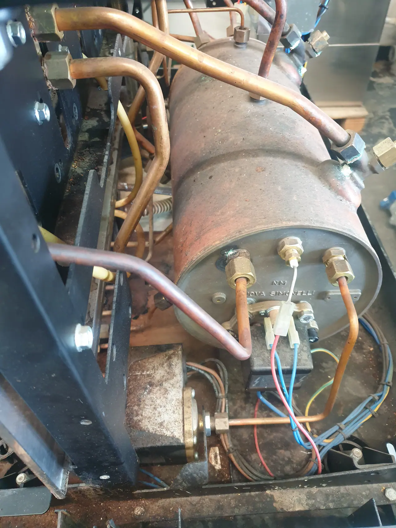 Coffee machine internal wiring boiler and plumbing during repair