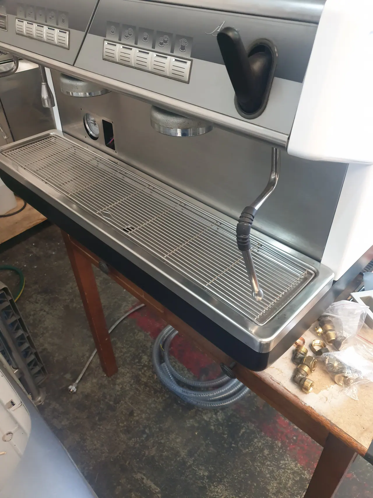 Commercial coffee machine front after service boiler descale and respray